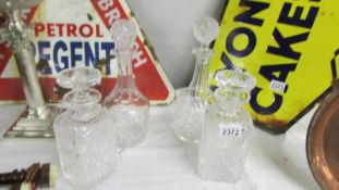 Four cut glass decanters. (collect only).