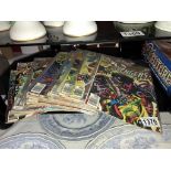 A collection of Marvel Avengers and Captain America comics,