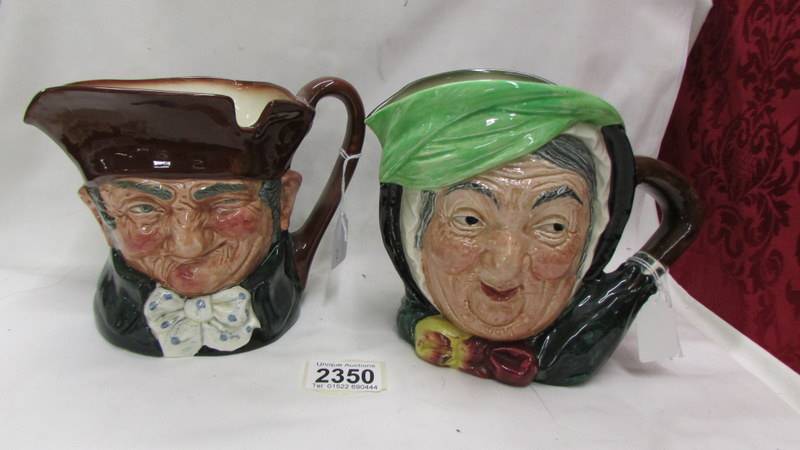 Two Royal Doulton character jugs being Old Charley and Sarey Gamp.