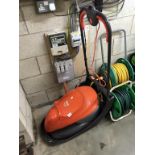 A Flymo easy glide 330 lawn mower