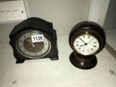 A 1950s Bentima mantle clock and another clock made from a bowls ball