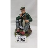 A Royal Doulton figurine, 'The Wayfarer' HN2362.