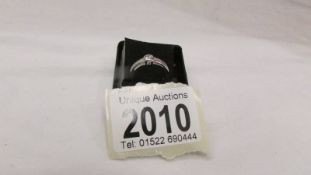 An 18ct white gold and diamond ring, size K half. ****Condition report**** Weight 3.