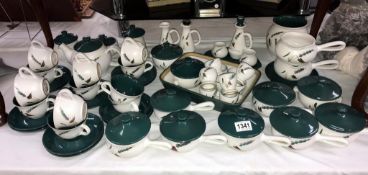 A good quantity of Denby Greenwheat dinner ware