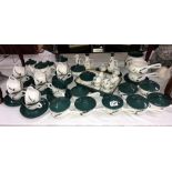 A good quantity of Denby Greenwheat dinner ware