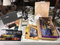 A large quantity of new artists materials including pastels, paper,