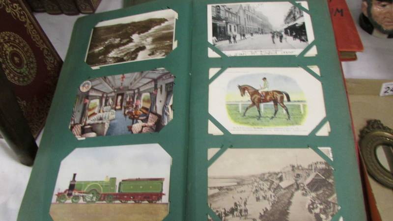 Three albums of postcards including an unusual double sided album, a scrap album, - Image 11 of 22