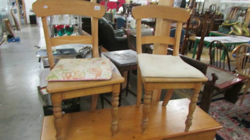 A pair of pine kitchen chairs. (Collect only).
