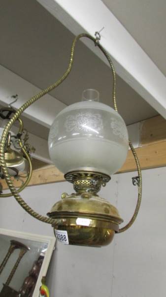 A hanging oil lamp. (collect only).