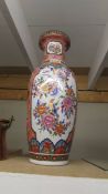 A tall oriental vase decorated with birds. (collect only).