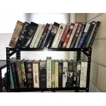 2 shelves of hardback books, various titles including Gilbert & Sillivan,