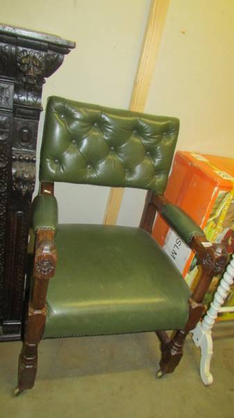 An oak framed elbow chair. (Collect only).