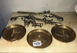 A pair of brass pistol wall ornaments and other brassware