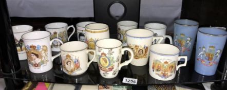 A quantity of commemorative royalty mugs etc