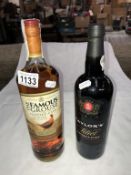 A bottle of Famous Grouse whisky and Taylors select port