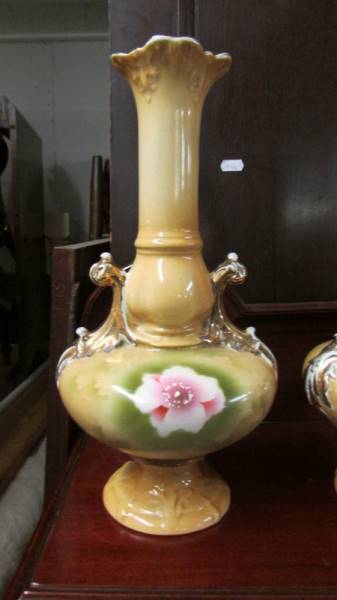 A pair of Staffordshire floral decorated vases. - Image 3 of 3