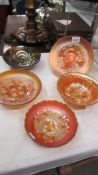 Three carnival glass bowls - Fenton acorn, Imperial rose, Northwood grape & cable,