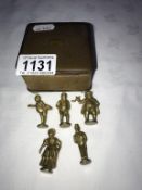 A nice small jewellery box holding 5 small brass Dickens? character figures