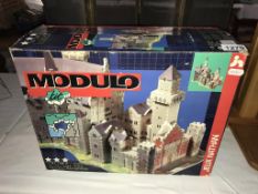 A Modulo 3D jigsaw sealed in bag of a chateau