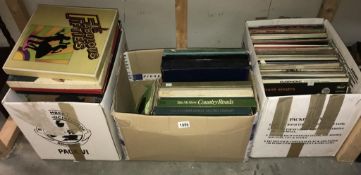 3 boxes of mixed vinyl 75's including boxed sets