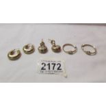 Three pairs of 9ct gold earrings, 8.3 grams.