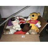 A quantity of soft toys including Winnie The Pooh and knitted toys