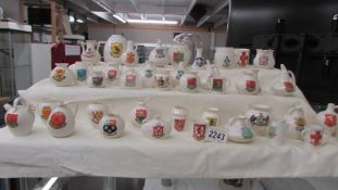 Forty pieces of W H Goss crested china.