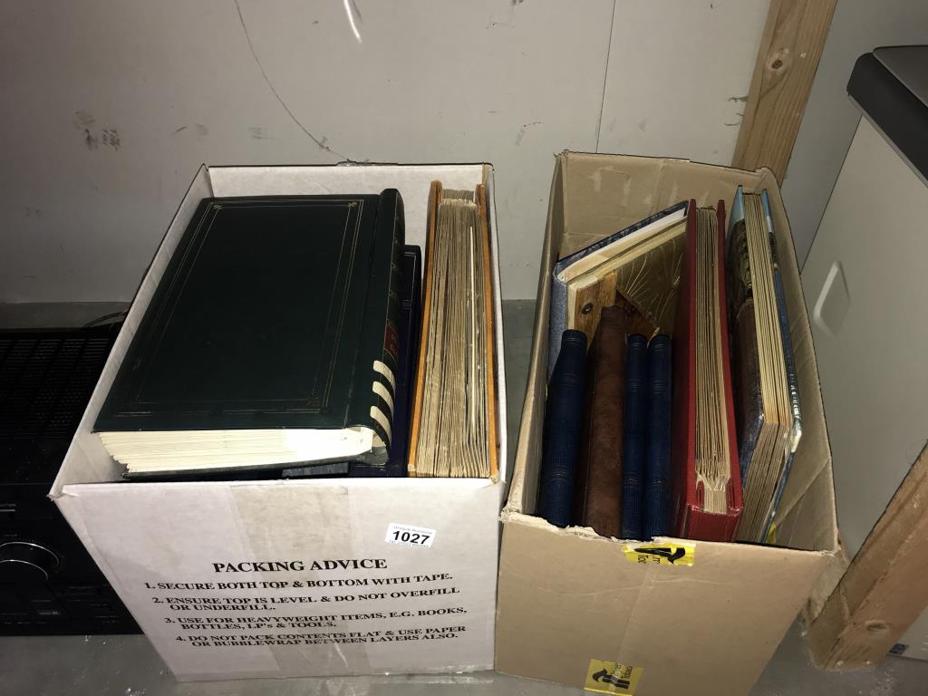 2 boxes of albums of photographs and postcards
