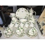 A Colclough ivy pattern tea set including tea and coffee pots plus bowls