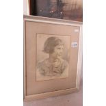 A framed and glazed pencil drawing of a young girl.