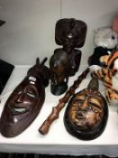 2 carved wooden African busts,