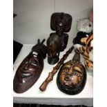 2 carved wooden African busts,