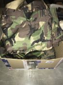 A box of camouflage trousers,