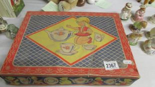 A vintage boxed child's tea set.