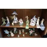 2 shelves of fairies etc