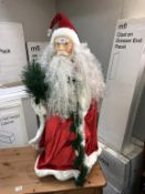 A large Santa Father Christmas figure