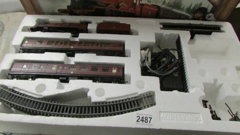 A Hornby R1025 Harry Potter and the Philosopher's Stone Hogwarts Express train set. - Image 3 of 3