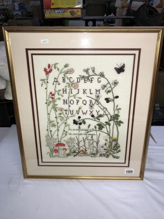 A large framed sampler by S Joyce '92