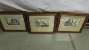 Three oak framed and glazed architectural engravings.