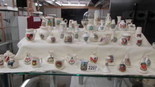 Fifty pieces of assorted crested china, various crests,