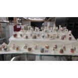 Fifty pieces of assorted crested china, various crests,