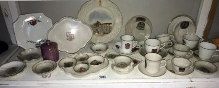 A good lot of crested china cups and saucers etc