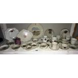 A good lot of crested china cups and saucers etc