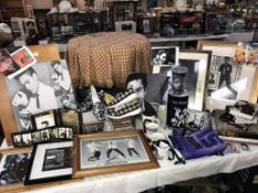 A large collection of Elvis memorabilia including Clock, lamp, pictures, mugs, shower curtain, cd's,