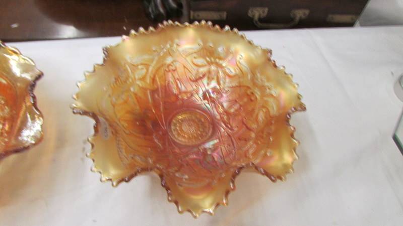 Four carnival glass marigold bowls - Imperial windmill, Fenton chrysanthemum, - Image 2 of 5