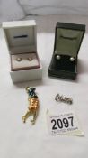 A pair of 9ct gold set cameo stud earrings, a pair of cultured pearl ear studs,