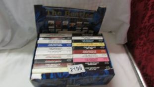 A boxed set of Beatles cassette tapes (box a/f).