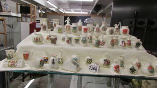 Fifty pieces of Arcadia crested china, various crests,
