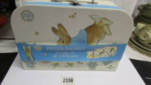 A Peter Rabbit storage set of three suitcases.