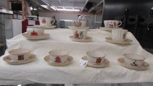Ten W H Goss crested tea cups and saucers.